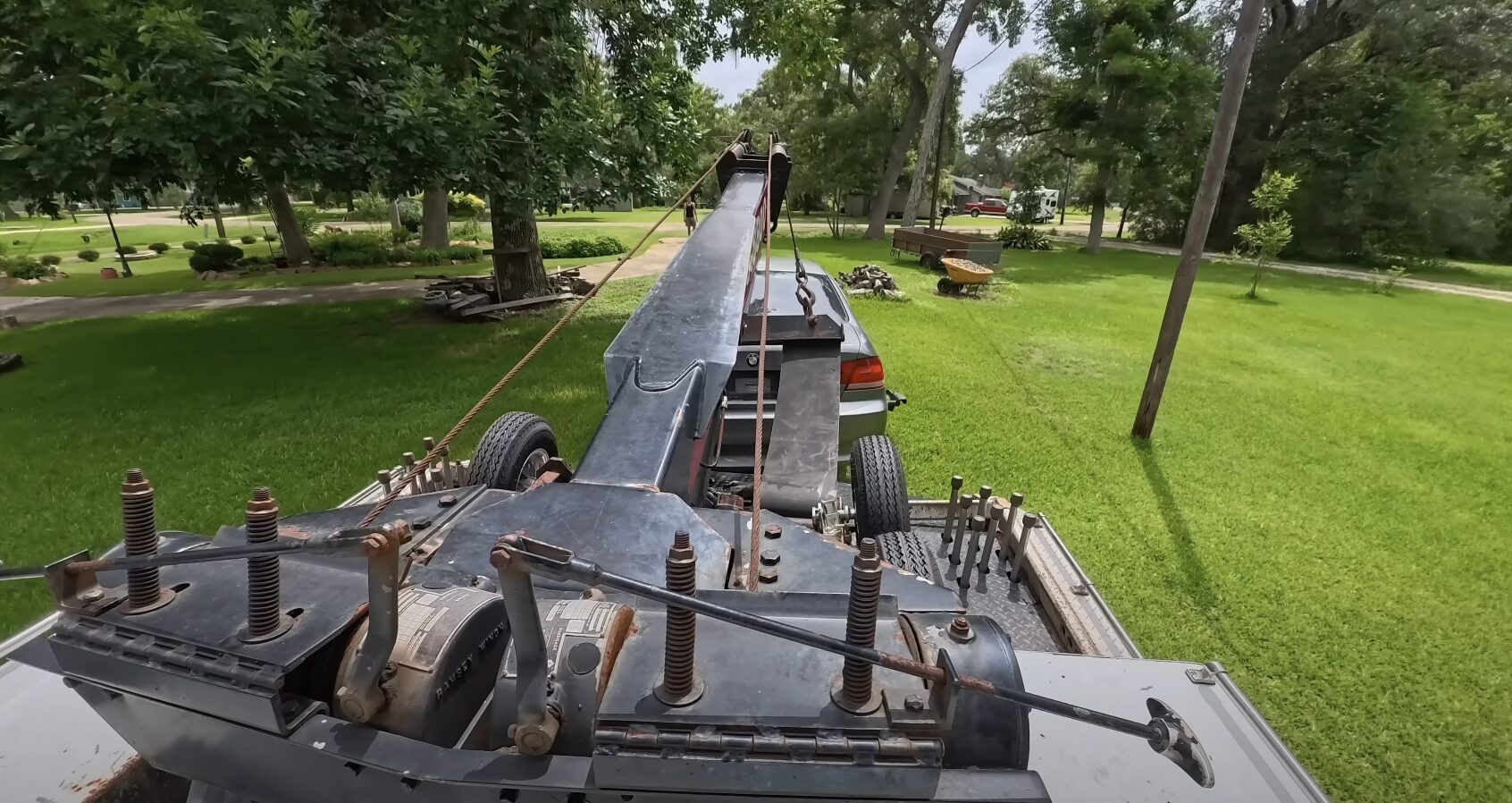 Professional towing equipment ensures safe vehicle transport Tow truck equipment and machinery for safe vehicle recovery